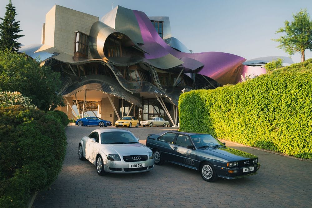 Audi conmemora seis décadas de innovación revolucionaria en diseño automotriz, desde el legendario Frankfurt Motor Show 1965 hasta los modernos vehículos eléctricos actuales, marcando historia constantemente. V12MAGAZINE